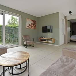 The Woonkamer of Type Wellness Zwembadvilla 8 - nr. 219 in Resort Arcen