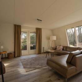The Woonkamer of Type Bosvilla Comfort 6-7 - nr. 16 Moerbei in Landal Bungalowpark Hoenderloo