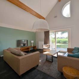 The Woonkamer of nr. 022 - type 6L1 in Landal Beach Resort Ooghduyne
