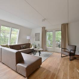 The Woonkamer of nr. 114 Kamperfoelie - type Bosvilla Comfort 6-7 in Landal Bungalowpark Hoenderloo