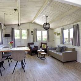 The Woonkamer of Type Buitenverblijf Wellness 4 - nr. 320 in Resort Arcen