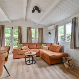 The Woonkamer of nr. 318 -  type Buitenverblijf Wellness 4 in Resort Arcen