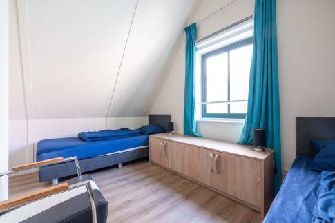 The Slaapkamer 2 of Type Zuiderzeezicht 4 -  nr. 204 in Resort Poort van Amsterdam