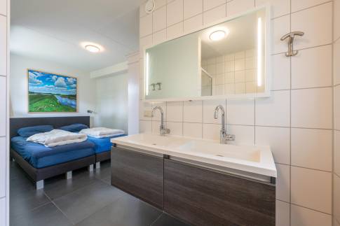 The Slaapkamer 1 of nr. 021 - type Breeuw 4 in Waterpark Belterwiede