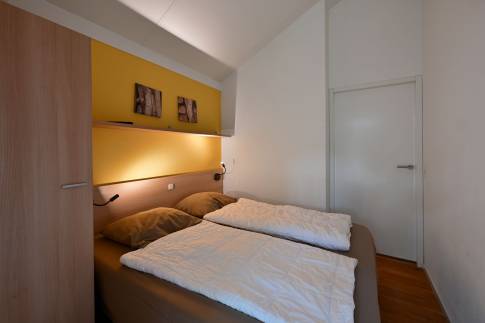 The Slaapkamer 1 of nr. 040 - type 4CK in Landal Stroombroek