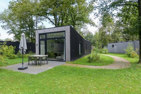 The Buiten of Type Forest Cabin Wellness 4 - nr. 127 in Roompot Vakantiepark Schaijk