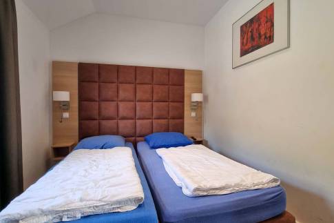 The Slaapkamer 2 of Type Landhaus 6 Luxe - nr. 35 in Eifelpark Kronenburger See