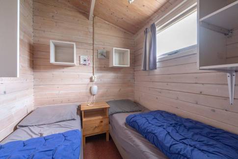 The Slaapkamer 2 of Type Buitenverblijf Comfort 6 - nr. 295 in Resort Arcen