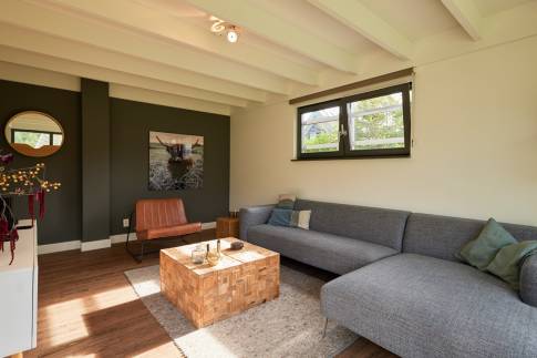 The Woonkamer of Type 8-persoons Wellness Tub & Sauna - nr. 13 in Vakantiepark Duynvoet