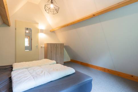 The Slaapkamer 4 of nr. 003 - type 8C Boerenhoeve in Landal Landgoed De Hellendoornse Berg