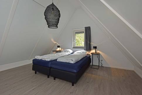 The Slaapkamer 4 of nr. 38 Ponybos - type Het Geheim van Otterlo 8P in EuroParcs De Zanding