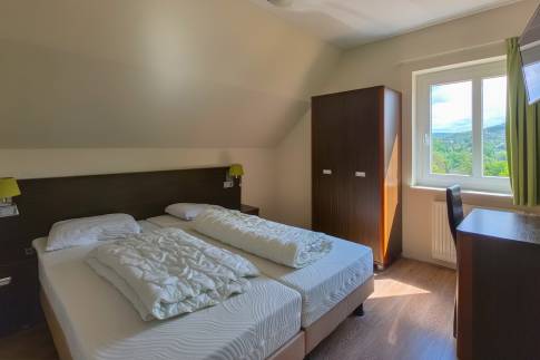 The Slaapkamer 2 of nr. 070 - type Villa Edersee Luxe in Dormio Resort Eifeler Tor