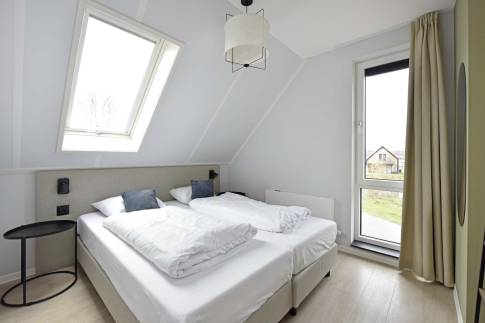 The Slaapkamer 9 of Type Vloedschuur - nr. 60 in Dormio Resort Nieuwvliet-Bad