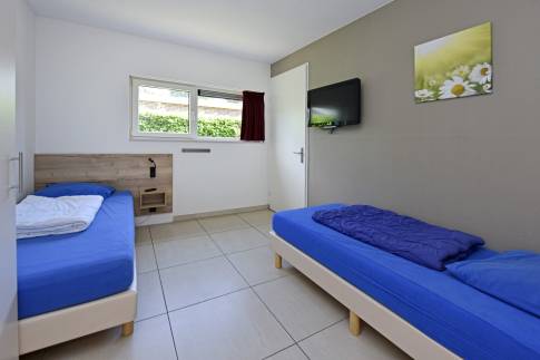 The Slaapkamer 2 of nr. 273 -  type Luxe Villa 4 in Resort Arcen