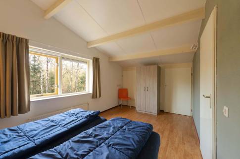 The Slaapkamer 3 of Type Bosvilla Comfort 6-7 - nr. 21 Spirea in Landal Bungalowpark Hoenderloo