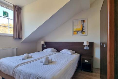 The Slaapkamer 1 of Type Penthouse Staffelsee Extra Luxe - nr. 123 in Dormio Resort Eifeler Tor