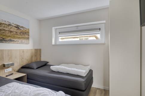 The Slaapkamer 2 of nr. 65 - type Bungalow 6A in Landal Beach Resort en Water Village