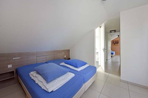 The Slaapkamer 4 of Type Wellness Zwembadvilla 8 - nr. 219 in Resort Arcen