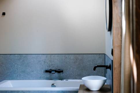The Badkamer of nr. T5 - type Tiny Wellness Cabin 2P in Landgoed De IJsvogel