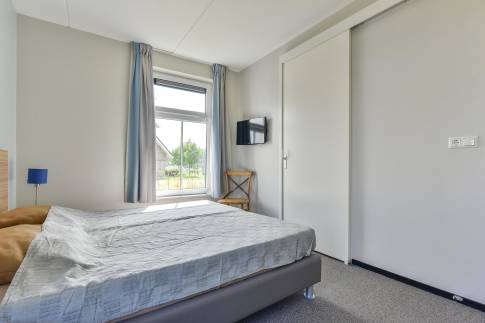 The Slaapkamer 1 of nr. 115 - type 6CK in Dormio Strand Resort Nieuwvliet-Bad