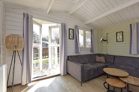 The Woonkamer of Type Buitenverblijf Wellness 4 - nr. 330 in Resort Arcen