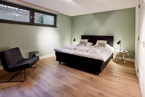 The Slaapkamer 1 of Type 8-persoons Wellness Tub & Sauna - nr. 13 in Vakantiepark Duynvoet