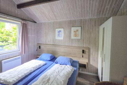 The Slaapkamer 1 of nr. 103 - type Eifel Comfort 6 in Eifelpark Kronenburger See