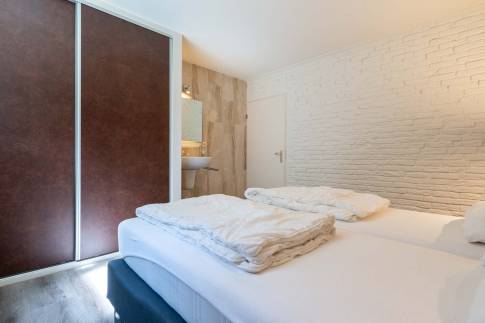 The Slaapkamer 2 of Type Wellness Bungalow - nr. B14 in Vakantiepark De Bosrand