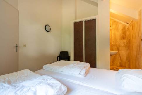 The Slaapkamer 1 of Type Wellness Bungalow - nr. B14 in Vakantiepark De Bosrand