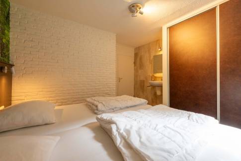 The Slaapkamer 3 of Type Wellness Bungalow - nr. B14 in Vakantiepark De Bosrand