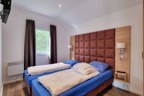 The Slaapkamer 1 of Type Landhaus 6 Luxe - nr. 35 in Eifelpark Kronenburger See