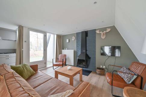 The Woonkamer of Type Veluwe Villa 4B - nr. 73 Pijplook in Landal Bungalowpark Hoenderloo