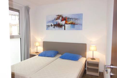 The Slaapkamer 2 of nr. 106 - type Landhaus 6 Luxe in Eifelpark Kronenburger See