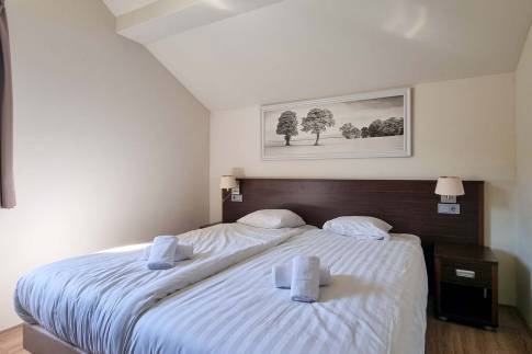 The Slaapkamer 2 of Type Penthouse Staffelsee Extra Luxe - nr. 123 in Dormio Resort Eifeler Tor