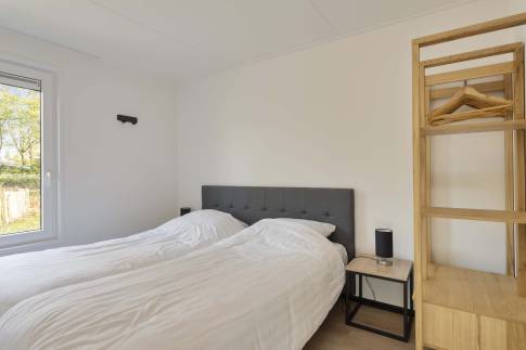 The Slaapkamer 2 of Type Forest Cabin 4 - nr. 130 in Vakantiepark Schaijk