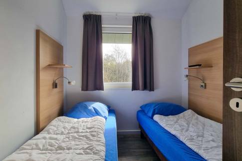 The Slaapkamer 3 of Type Landhaus 6 Luxe - nr. 35 in Eifelpark Kronenburger See