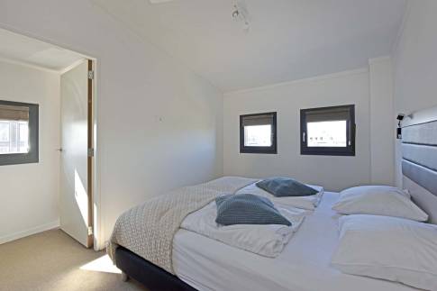 The Slaapkamer 1 of Type Studio Deluxe Landzijde 2p - nr. 2a in Beach Resort Punt West