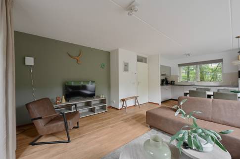 The Woonkamer of nr. 114 Kamperfoelie - type Bosvilla Comfort 6-7 in Landal Bungalowpark Hoenderloo