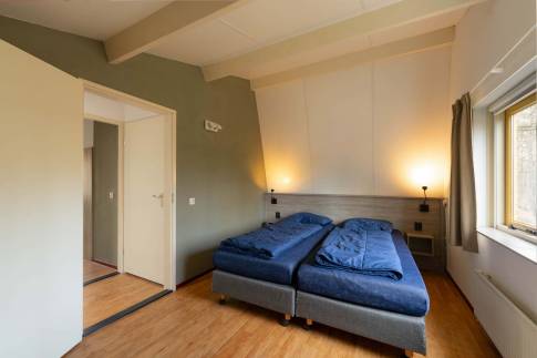 The Slaapkamer 3 of Type Bosvilla Comfort 6-7 - nr. 21 Spirea in Landal Bungalowpark Hoenderloo