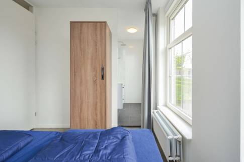The Slaapkamer 1 of Type Munt - nr. 329 in Resort Poort van Amsterdam