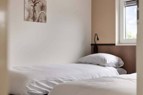 The Slaapkamer 2 of Type Strandlodge 4 in Vakantiepark Boomhiemke