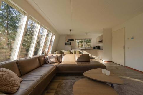 The Woonkamer of Type Bosvilla Comfort 6-7 - nr. 16 Moerbei in Landal Bungalowpark Hoenderloo