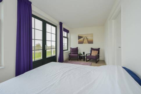 The Slaapkamer 1 of Type Zuiderzeezicht - nr. 227 in Resort Poort van Amsterdam