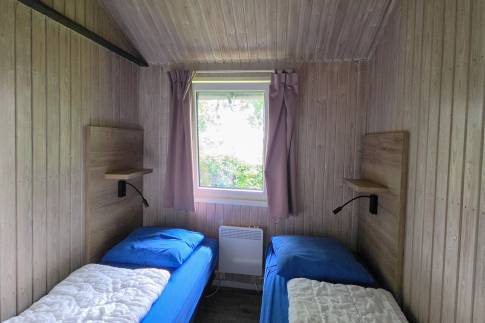 The Slaapkamer 3 of nr. 103 - type Eifel Comfort 6 in Eifelpark Kronenburger See