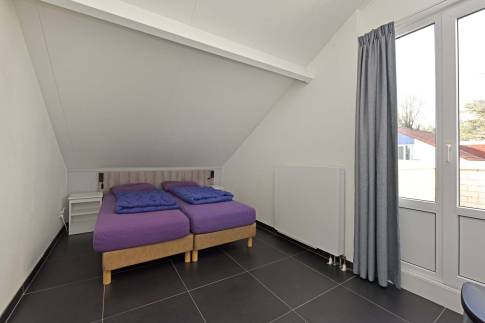 The Slaapkamer 2 of Type Luxe Villa 4B - nr. 93 in Resort Arcen