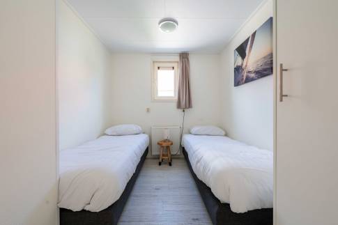The Slaapkamer 4 of nr. 403 - type Waddenlodge 8 in Vakantiepark Boomhiemke