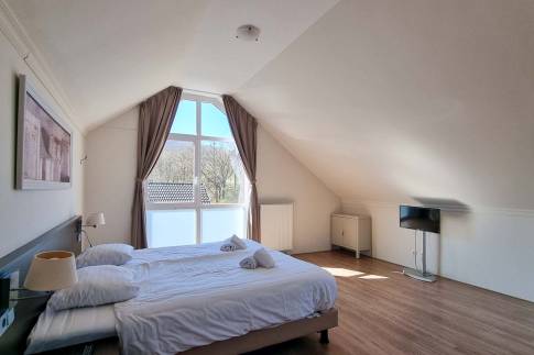The Slaapkamer 3 of Type Penthouse Staffelsee Extra Luxe - nr. 123 in Dormio Resort Eifeler Tor