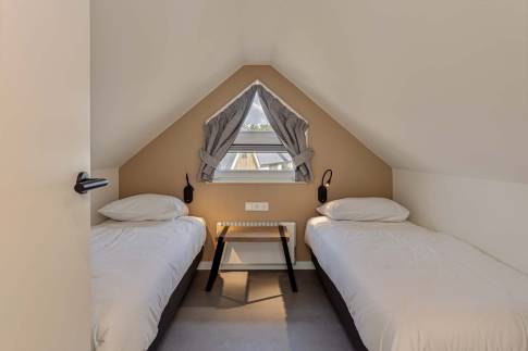 The Slaapkamer 3 of Type Strandlodge 8 - nr. 36 in Vakantiepark Boomhiemke