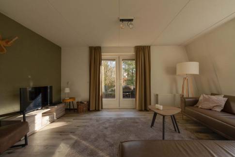 The Woonkamer of Type Bosvilla Comfort 6-7 - nr. 16 Moerbei in Landal Bungalowpark Hoenderloo