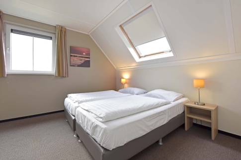 The Slaapkamer 2 of nr. 137 - type 6EL in Dormio Strand Resort Nieuwvliet-Bad